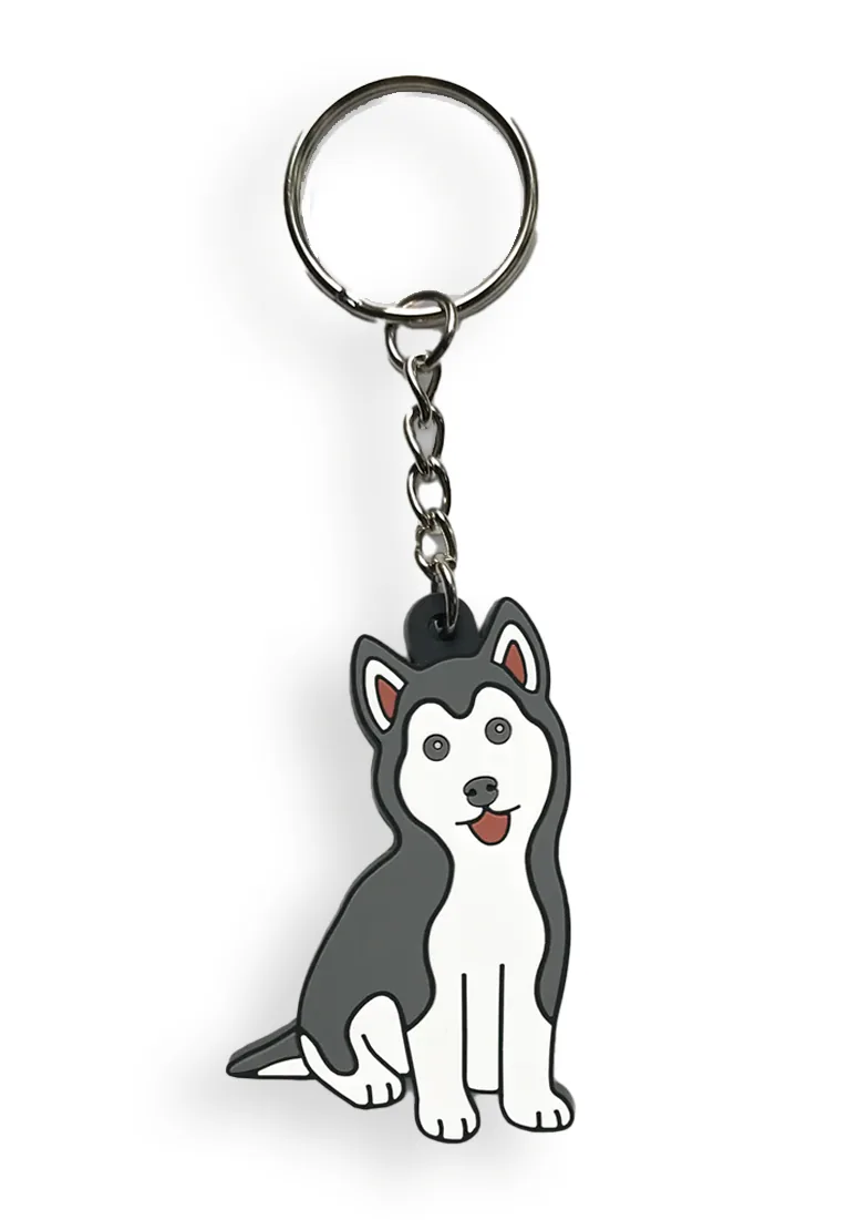 Portachiavi in PVC 2D sagomato a husky bianco e grigio con anello in metallo, esempio di gadget promozionale